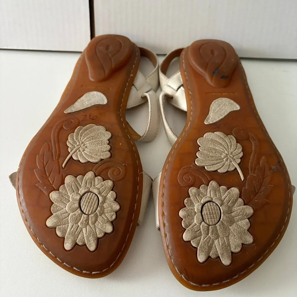 Born Gold and beige sandals